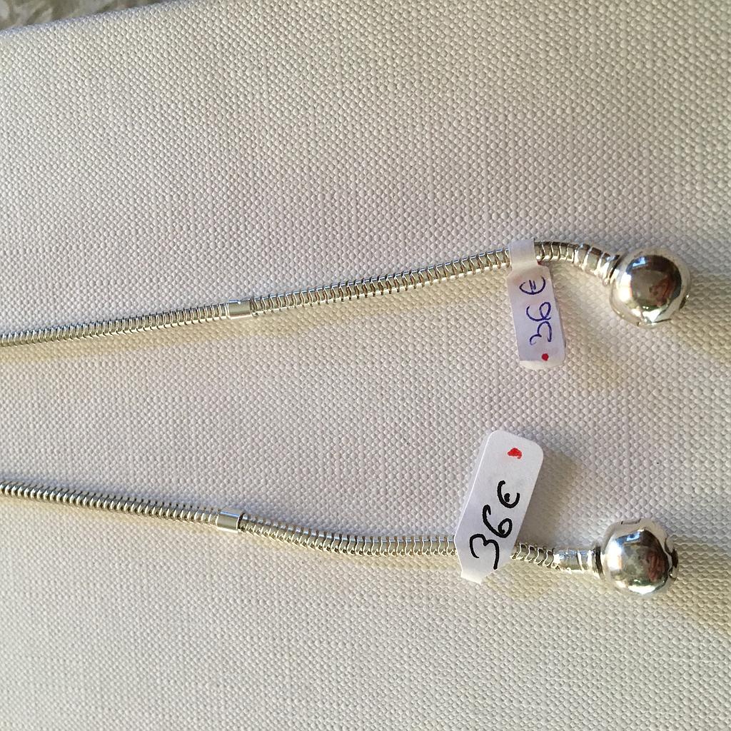 Puls. Plata Charms 585